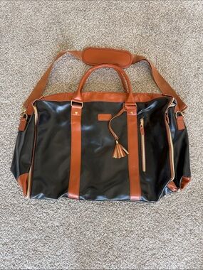 Black and Tan Shoulder Duffel Bag with Tassel Accent